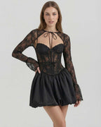 Lauven Luna Mini Dress featuring sheer lace bodice and satin bubble skirt for a stylish look.