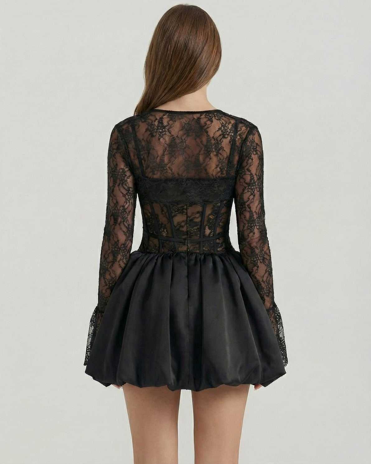Luna Mini Dress by Lauven, showcasing sheer lace bodice and satin bubble skirt from the back.