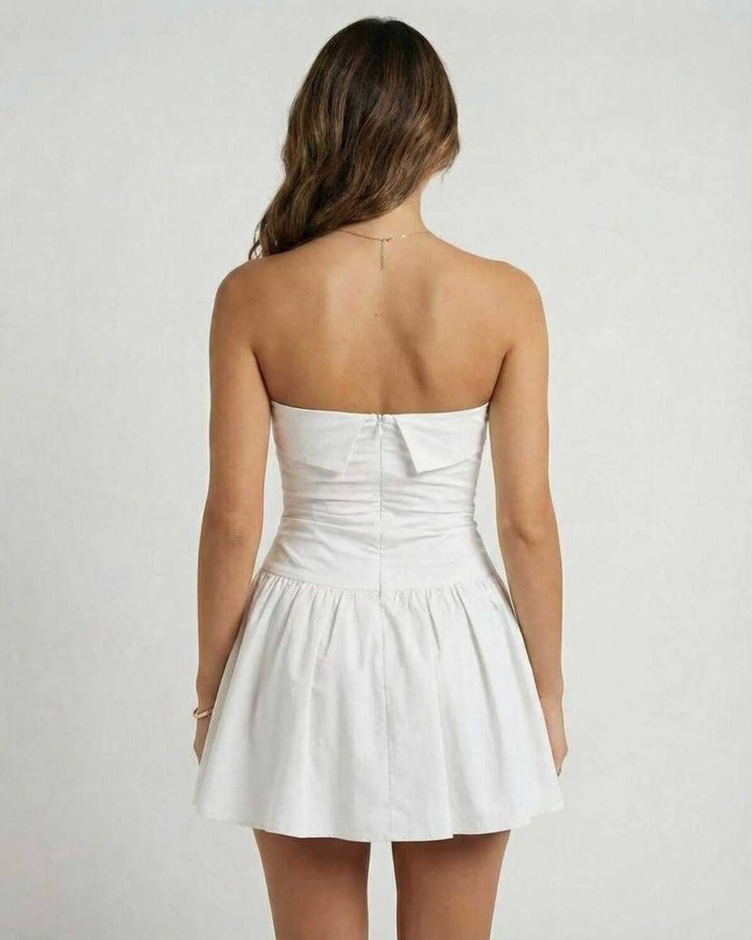 Lauven Luna Mini Dress back view, classic white strapless A-line silhouette, perfect for summer occasions.