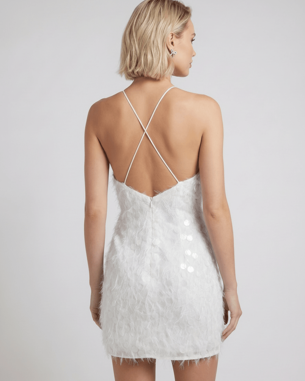 Lunelle Mini Dress by Lauven, featuring a halter neck, sequins, and bodycon silhouette for a modern, sleek look.