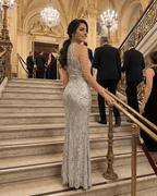 Luxe Maxi Dress by Lauven featuring silver velvet fabric and intricate sequin patterns at a glamorous event.