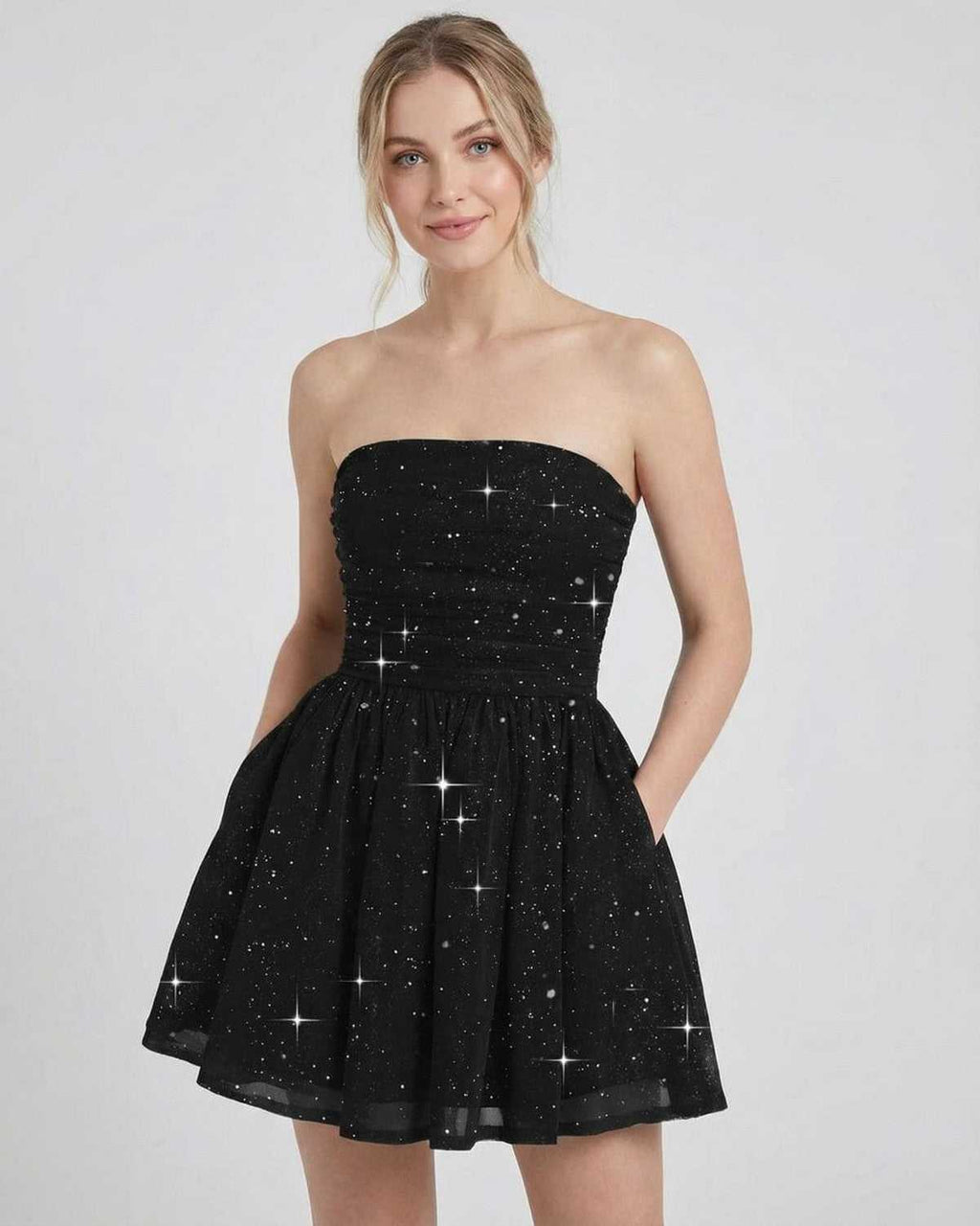 Lyra Mini Dress by Lauven featuring a strapless A-line silhouette with bow detail and a subtle shimmer finish.