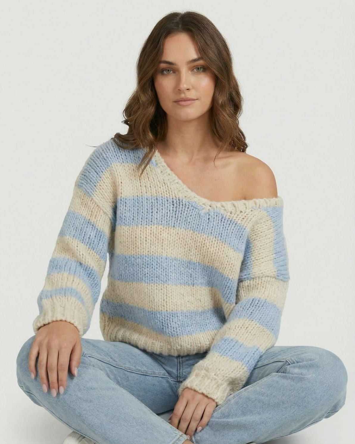 Marina Pullover by Lauven, a stylish striped V-neck knit sweater in light blue and ivory shades.