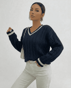 Marina Sweater by Lauven, a stylish cable knit V-neck pullover in navy blue, perfect for everyday wear.