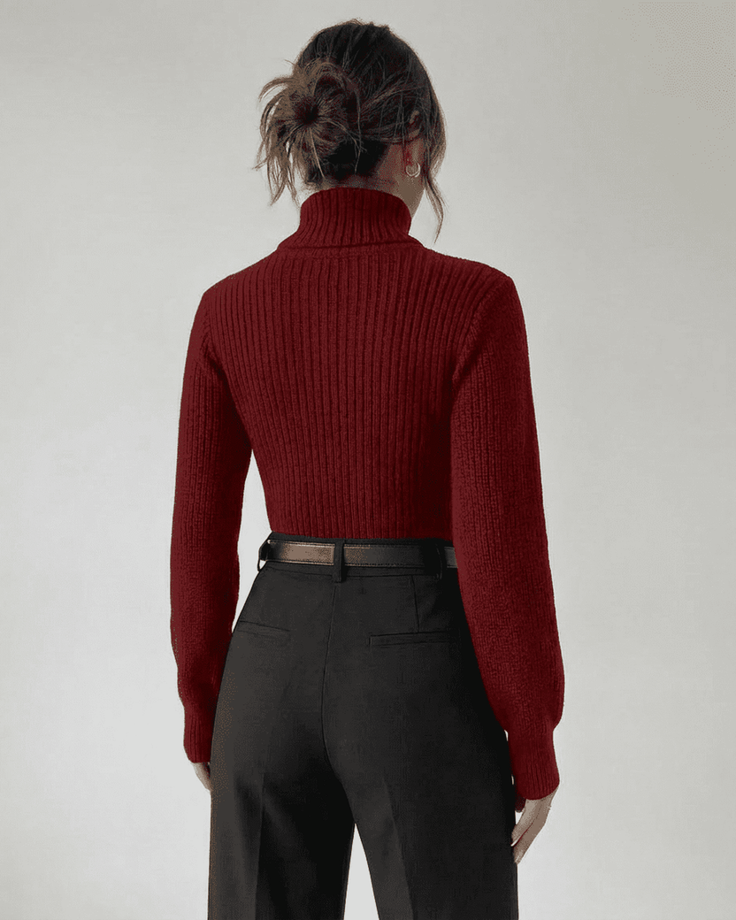 Back view of a woman wearing a Merlot Sweater by Lauven, featuring a mock neck and ribbed knit design.