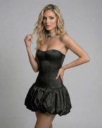 Model wearing Lauven Midnight Mini Dress, a black strapless bodycon mini dress with backless detail.
