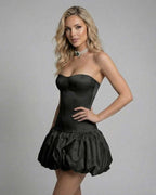 Midnight Mini Dress by Lauven – Black strapless bodycon mini dress showcasing backless detail and flared skirt.