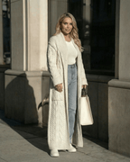 Milano Cardigan styled with denim and a white top, showcasing Lauven's elegant long cable-knit design.