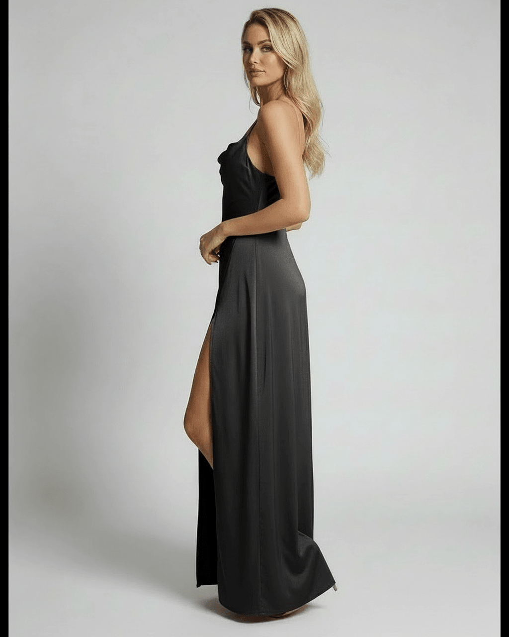 Monaco Maxi Dress by Lauven featuring a sleek black satin design with high slit and elegant evening silhouette.