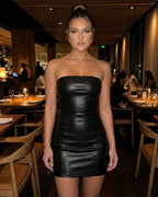 Monaco Mini Dress by Lauven, sleek black strapless PU pencil dress perfect for warm-weather styling.