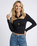 Monaco Pullover by Lauven – Women’s black halter neck long sleeve pullover with cold shoulder detail.