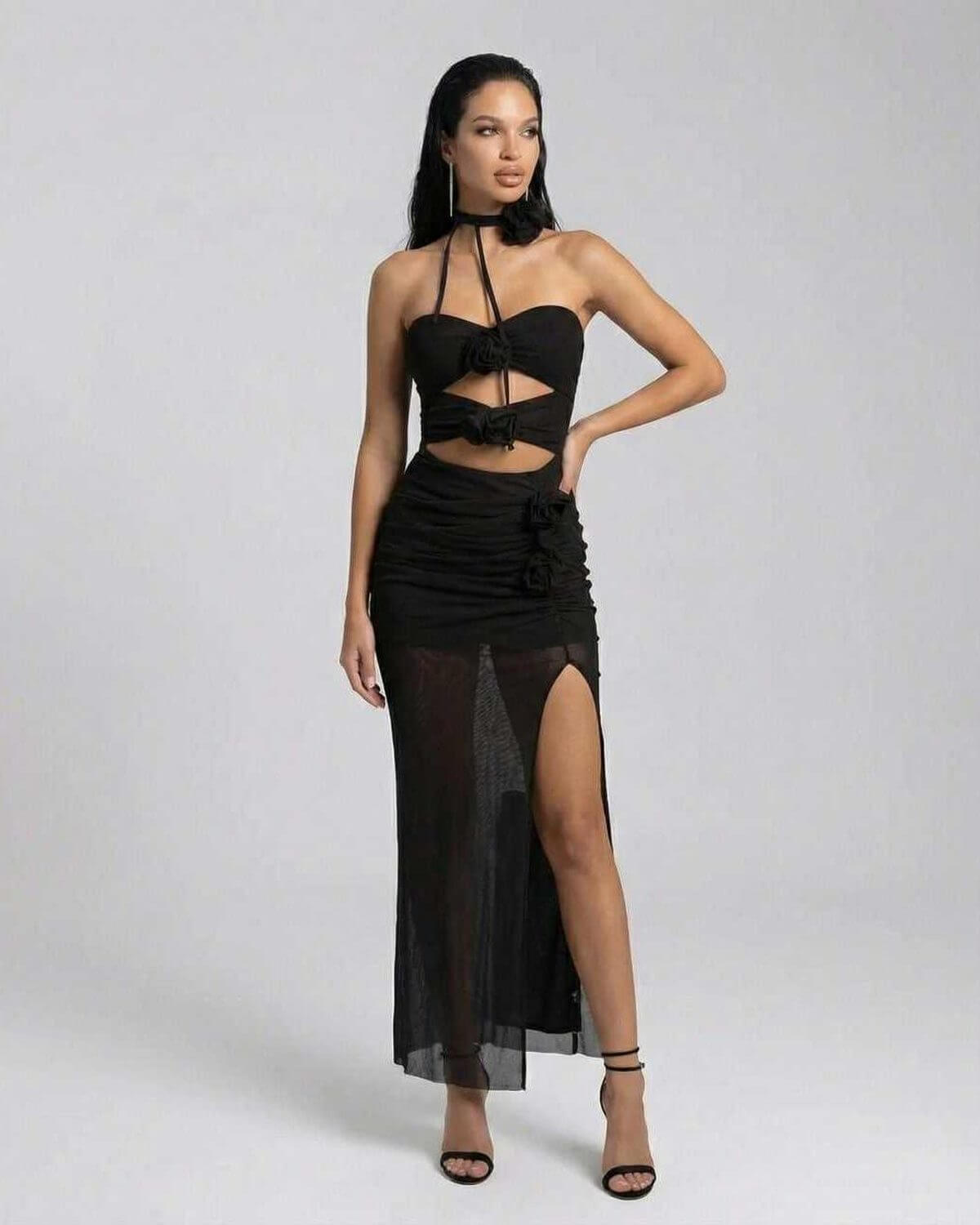 Nerina Maxi Dress by Lauven - Elegant black halter neck knitted dress with high stretch and cutout silhouette.