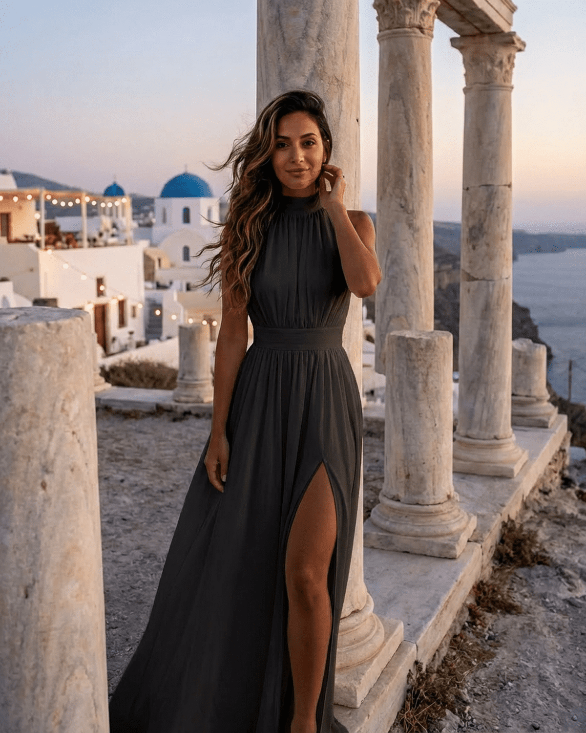 Noctis Maxi Dress by Lauven, sleeveless turtleneck dress with high waist and side slit against scenic background.