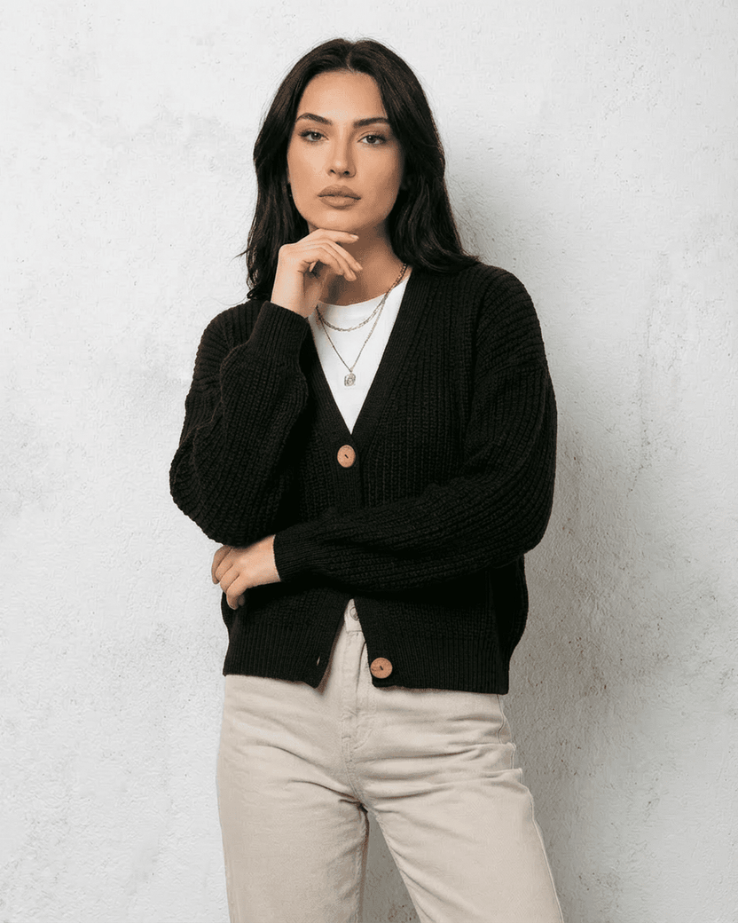 Noir Cardigan by Lauven – Stylish black knitwear with a V-neck and button detail, perfect for fall and winter.