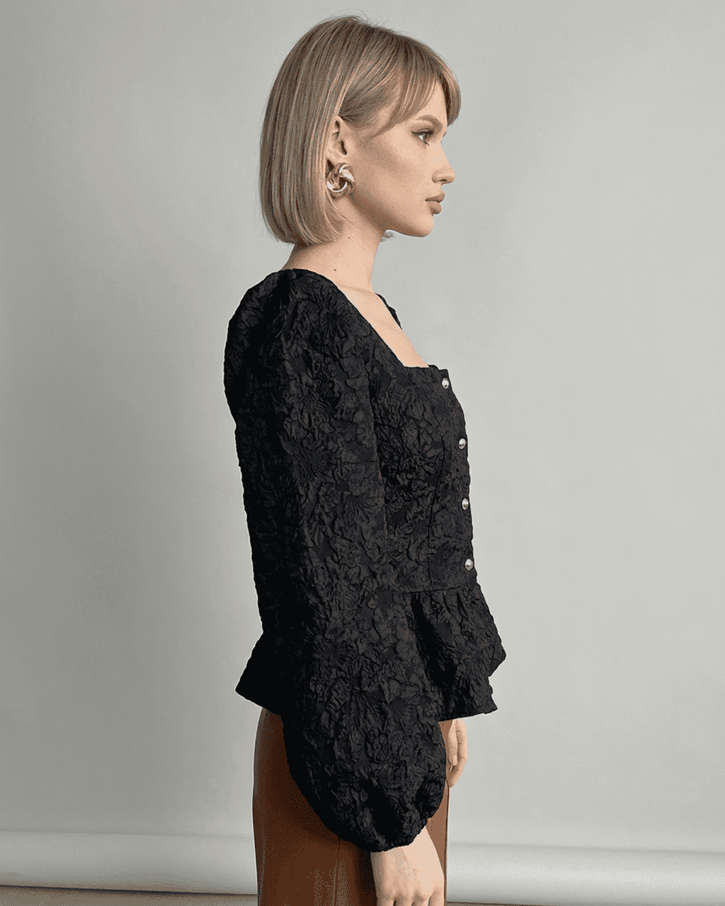 Noir Corset Top by Lauven - Jacquard blouse with puff sleeves and square neckline, showcasing fine craftsmanship.