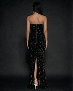 Back view of the Noir Maxi Dress by Lauven, an elegant strapless sequin evening gown with a subtle train.