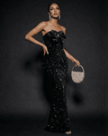 Noir Maxi Dress by Lauven, strapless sequin gown with satin bow and glamorous silhouette.