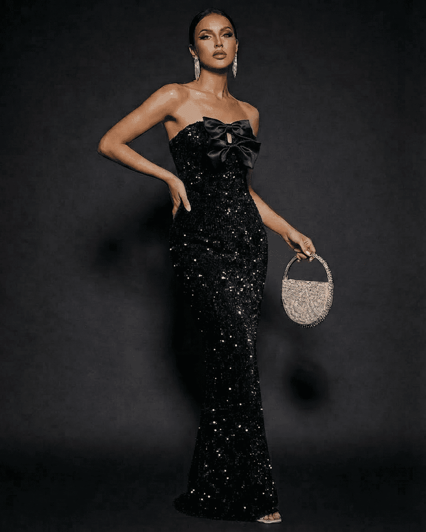 Noir Maxi Dress by Lauven, strapless sequin gown with satin bow and glamorous silhouette.