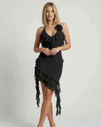 Noir Mini Dress by Lauven with ruffle detail and asymmetrical hemline in classic black.