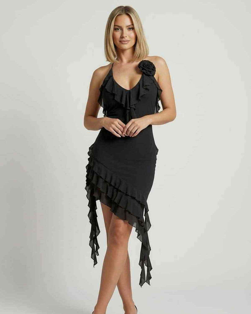Noir Mini Dress by Lauven with ruffle detail and asymmetrical hemline in classic black.