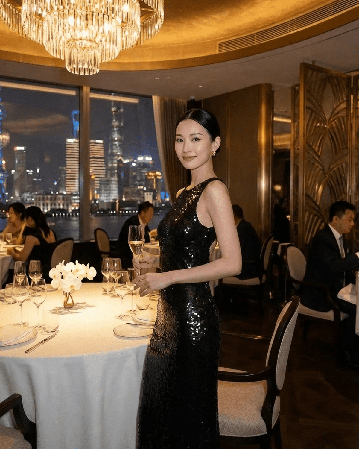 Noiré Maxi Dress by Lauven worn in an elegant restaurant setting, showcasing backless design and floral sequins.