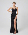 Noiré Maxi Dress by Lauven, featuring a sleek bodycon silhouette and high side slit for an elegant evening look.