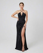 Noiré Maxi Dress by Lauven, featuring a sleek bodycon silhouette and high side slit for an elegant evening look.