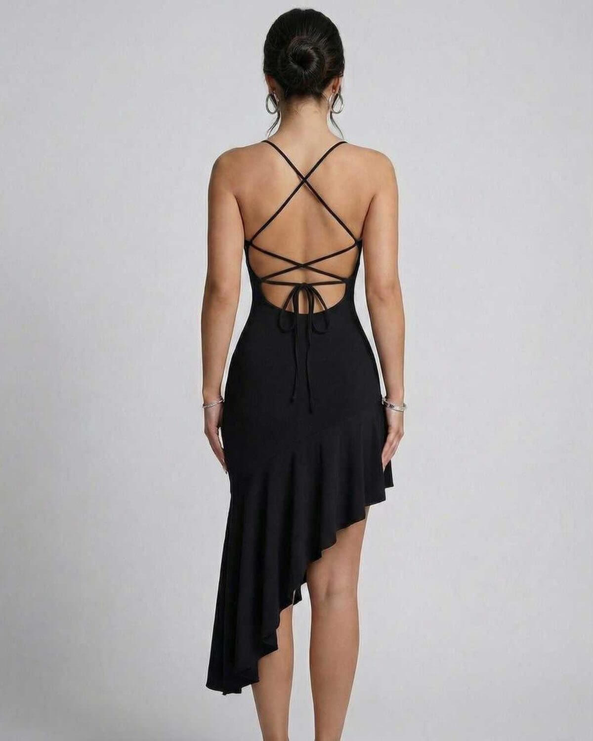 Elegant back view of the Nova Midi Dress by Lauven featuring an asymmetrical hem and backless design.