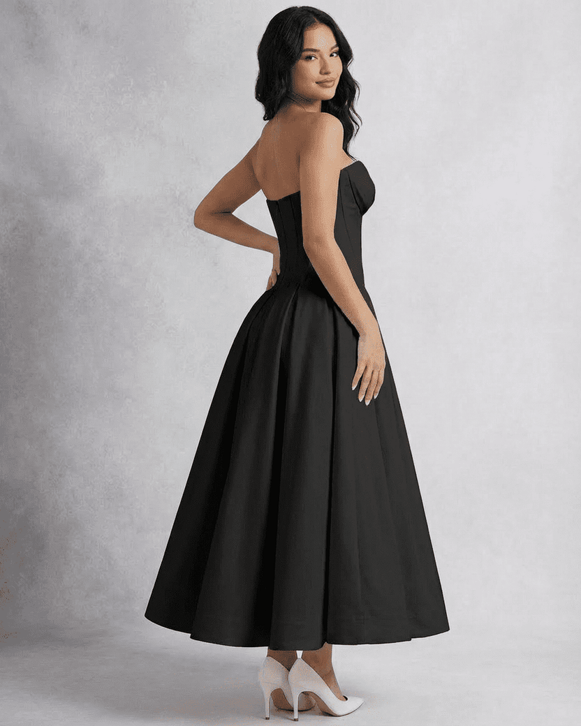 Nova Midi Dress by Lauven in elegant black, featuring a strapless corset design and flowing A-line skirt.