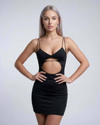 Lauven Nova Mini Dress with cutout detail and spaghetti straps in black, showcasing a sleek and sexy silhouette.