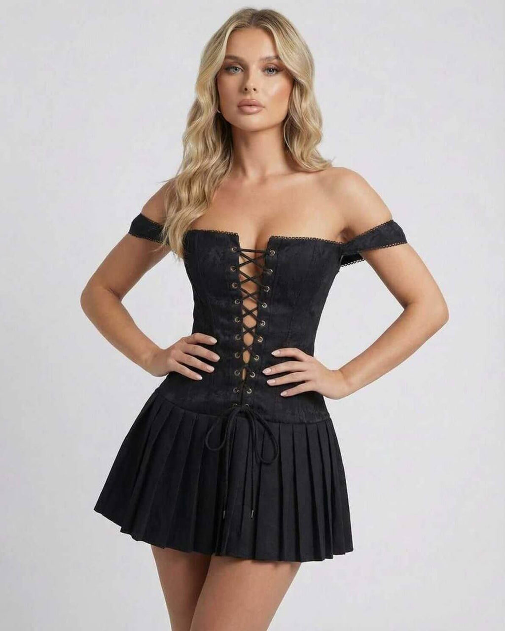 Nova Mini Dress by Lauven, featuring off-shoulder straps and a lace-up design in sleek black.