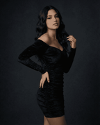Lauven Nova Mini Dress with ruched velvet design, featuring a deep V-neckline and elegant silhouette.