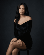 Lauven Nova Mini Dress in black velvet, showcasing a sophisticated bodycon silhouette and elegant deep V-neckline.