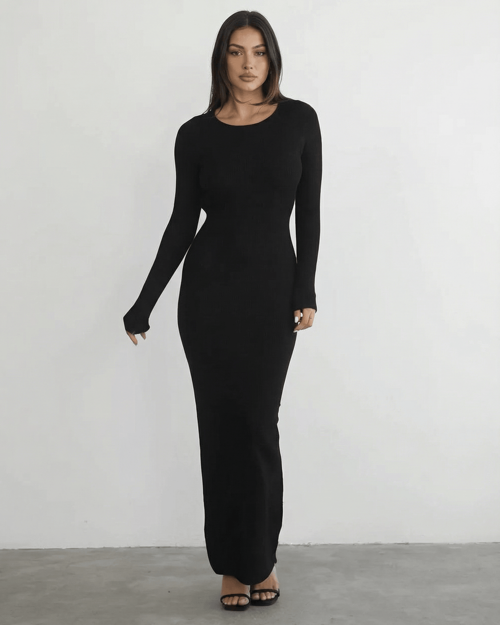 Nyx Maxi Dress by Lauven featuring a long sleeve black design and sleek pencil silhouette.