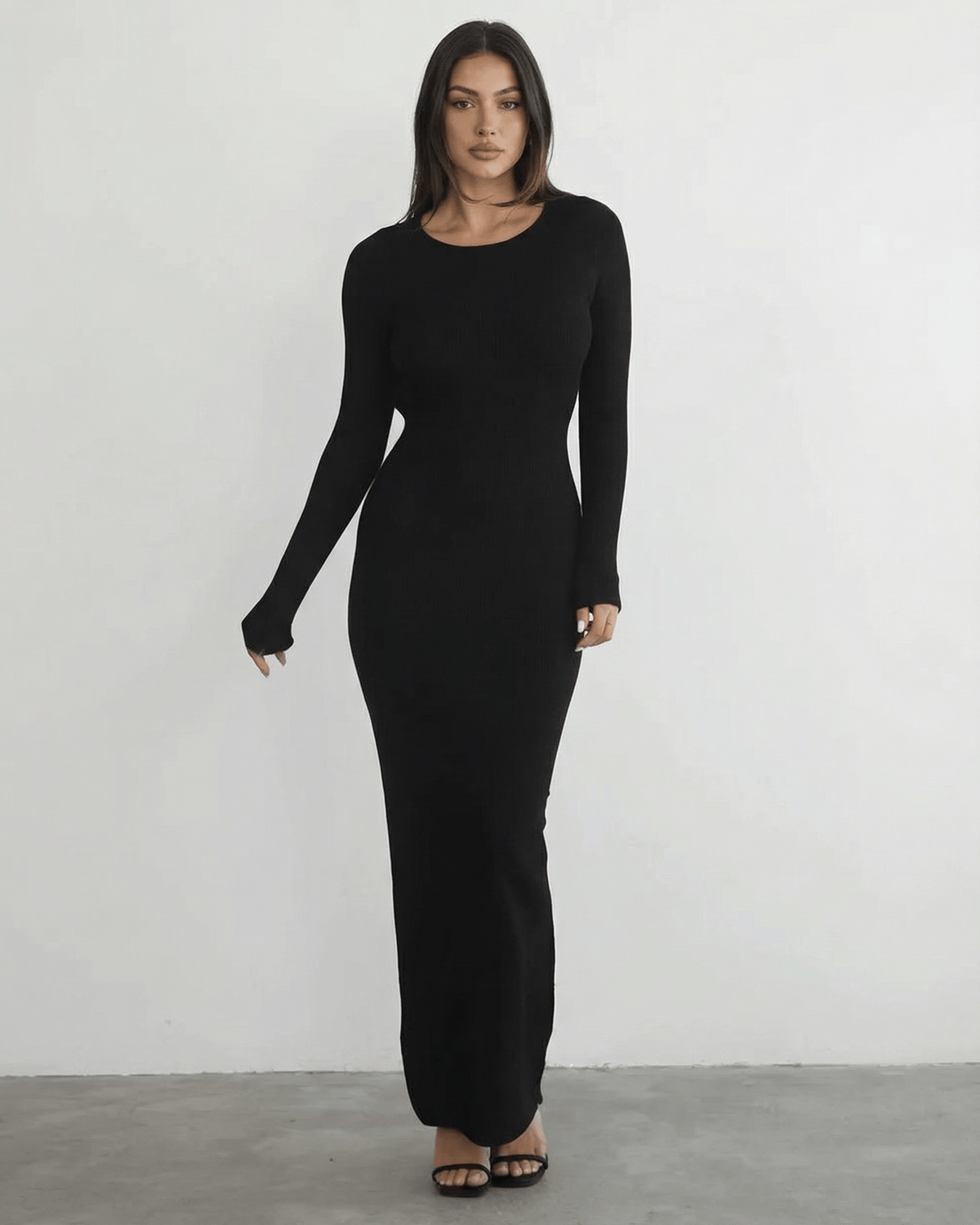 Nyx Maxi Dress by Lauven featuring a long sleeve black design and sleek pencil silhouette.