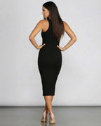 Nyxara Midi Dress by Lauven showcases a sleek bodycon silhouette with a dramatic halter neckline, perfect for special occasions.