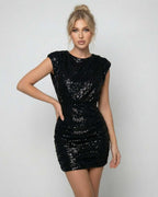 Onyx Mini Dress by Lauven, black sequin bodycon mini dress featuring a round neck and a sleek silhouette.