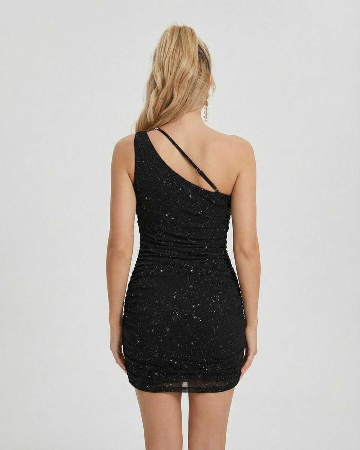 Orion Mini Dress by Lauven, asymmetrical one-shoulder design with chain detail, showcasing a sophisticated black silhouette.