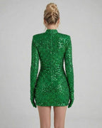 Orion Mini Dress in Luxe Emerald Green Sequins by Lauven, showcasing a fitted silhouette with full-length sleeves.