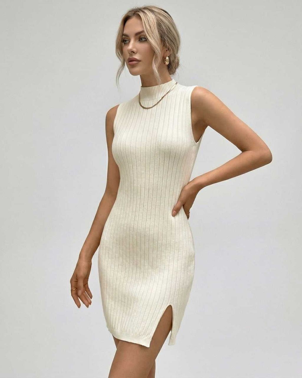 Orionis Mini Dress by Lauven - Ribbed Sleeveless Turtleneck Mini Dress in cream with side slit.