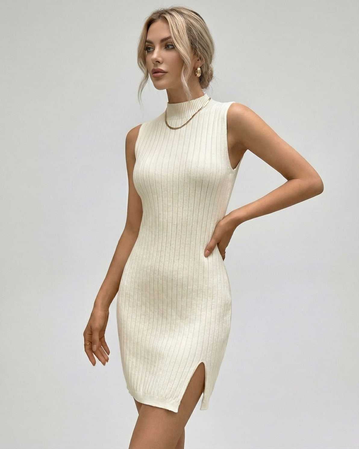 Orionis Mini Dress by Lauven - Ribbed Sleeveless Turtleneck Mini Dress in cream with side slit.
