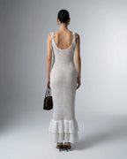 Pearl Maxi Dress by Lauven showcasing a hollow-out knit texture in an elegant white design.