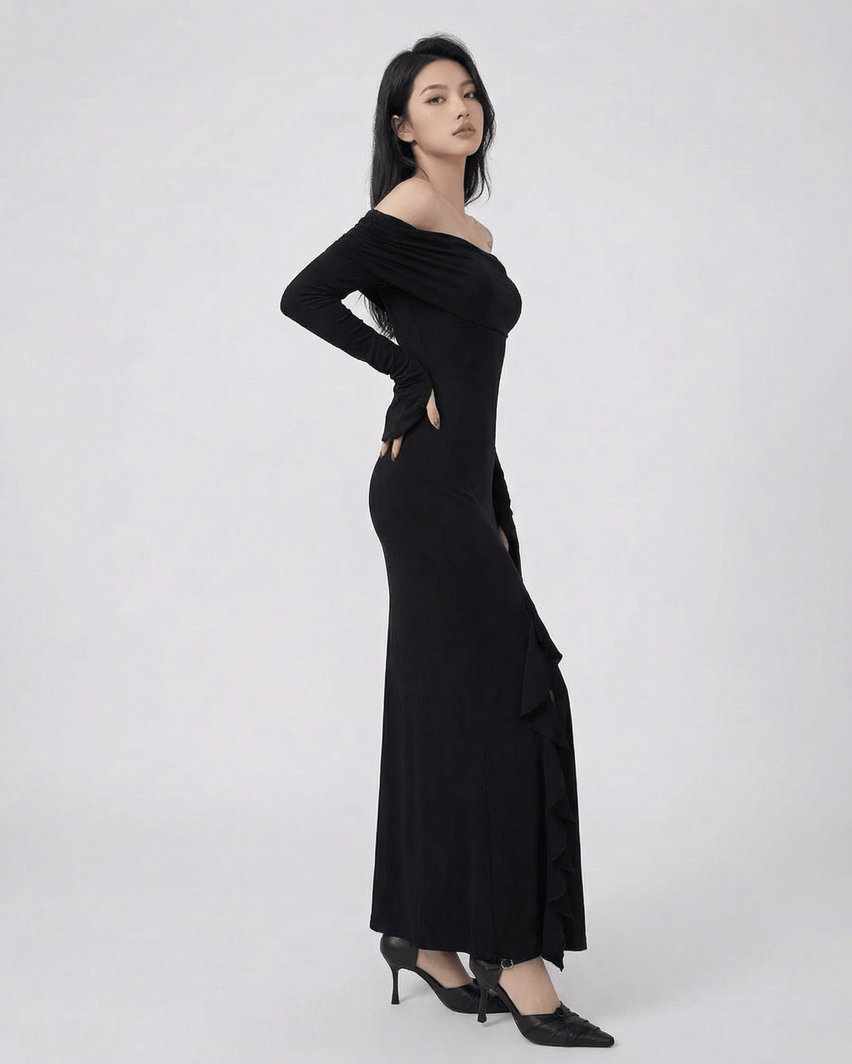 Raven Maxi Dress by Lauven - Off-shoulder asymmetrical ruffle dress with flare sleeves in black.