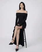 Raven Maxi Dress by Lauven — Black off-shoulder dress with asymmetrical ruffles and flare sleeves.