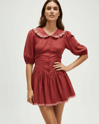 Rosette Mini Dress by Lauven featuring a Peter Pan collar, puff sleeves, and delicate ruching details.