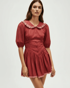 Lauven Rosette Mini Dress with Peter Pan Collar and Puff Sleeves in red.
