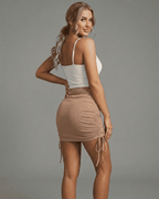 Model wearing Lauven Sand Mini Skirt featuring adjustable drawstrings and a flattering bodycon fit.