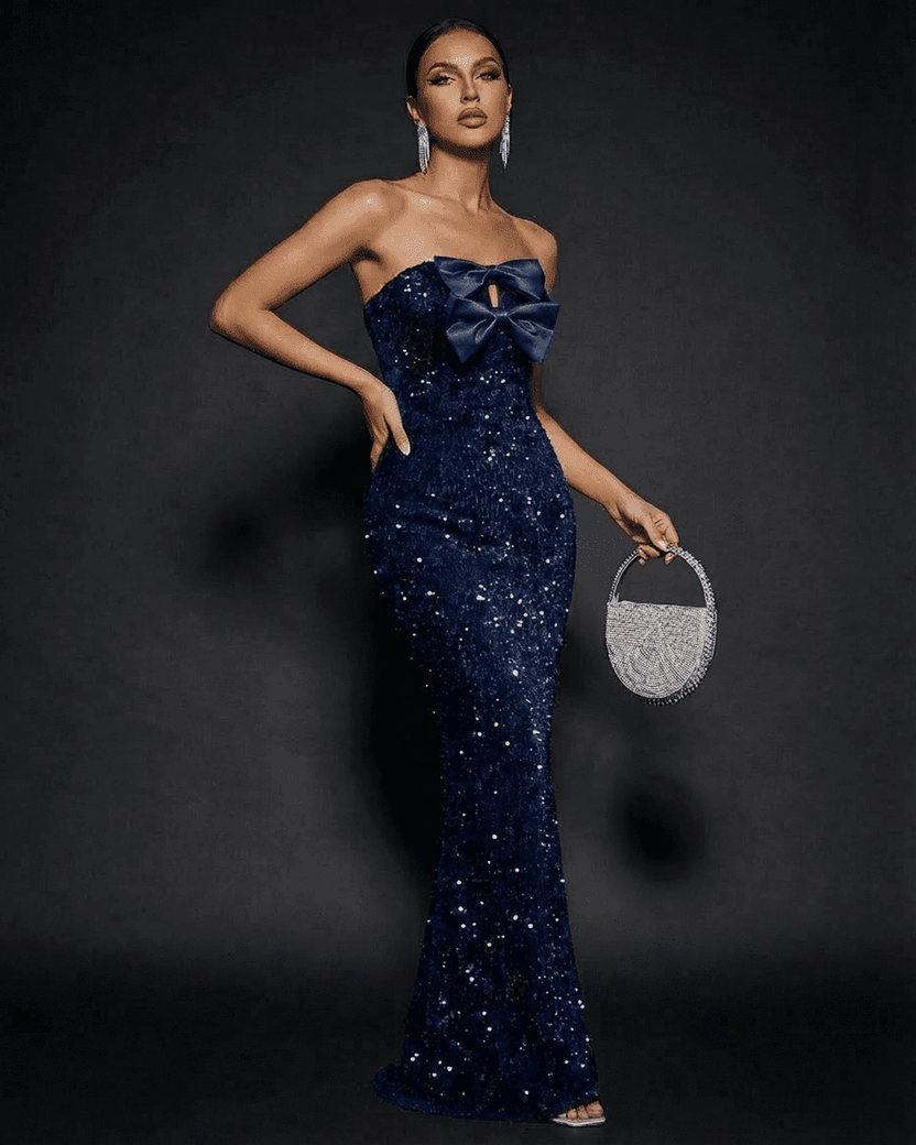 Sapphire Maxi Dress by Lauven, a stunning strapless sequin dress with a bow detail, perfect for glamorous occasions.