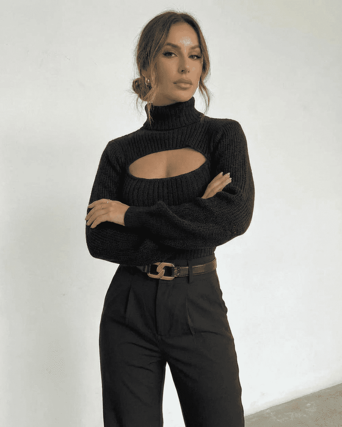 Sarina Sweater by Lauven - Chic black hollow out mock neck sweater styled with trousers.