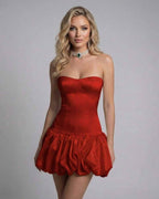 Scarlet Mini Dress by Lauven – Red strapless bodycon mini dress with backless detail and voluminous skirt.